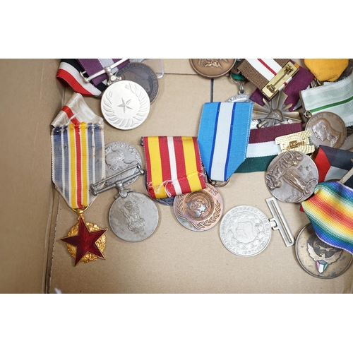 287 - Thirty world military and commemorative medals including; a Belgium War Aid Medal 1914-18, Nigeria R... 