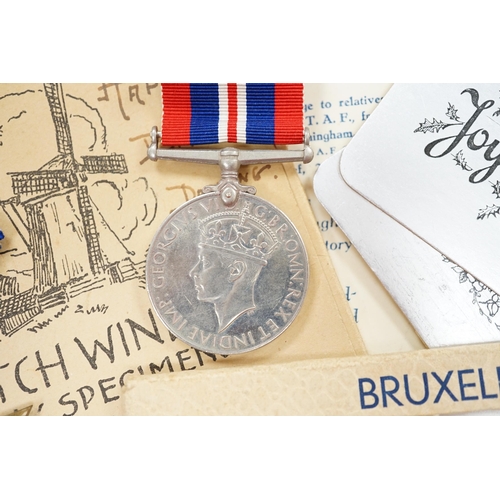 290 - An RAF silver mug, and framed drawing of a map of Belgium and surrounding countries relating to 83rd... 