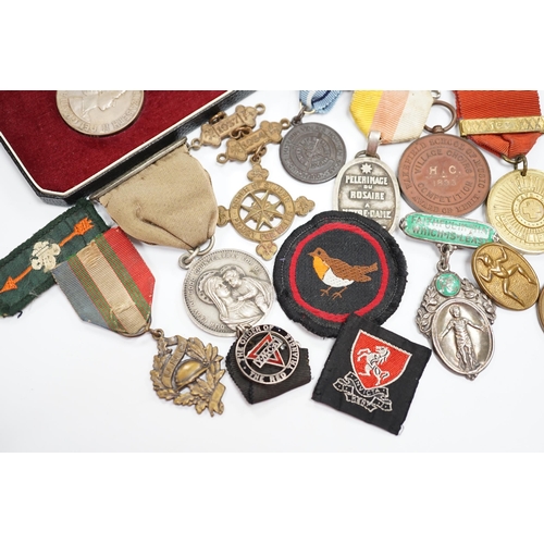 291 - A collection of medals and badges, including eight Special Constabulary Service Medals, Fire Service... 