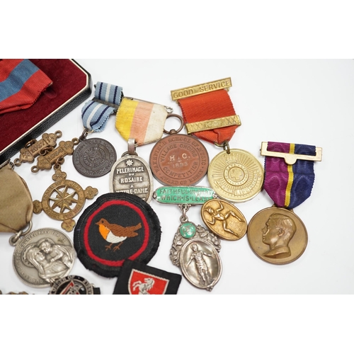 291 - A collection of medals and badges, including eight Special Constabulary Service Medals, Fire Service... 