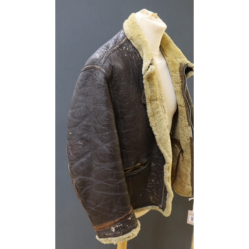 299 - An American US Air Force sheepskin flying jacket, with applied label in collar reading TYPE .. SIZ... 