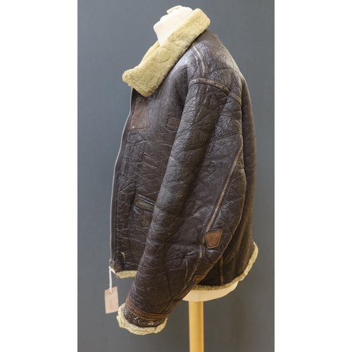 299 - An American US Air Force sheepskin flying jacket, with applied label in collar reading TYPE .. SIZ... 