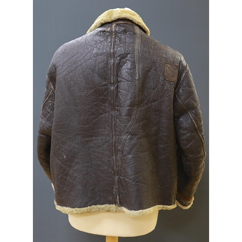 299 - An American US Air Force sheepskin flying jacket, with applied label in collar reading TYPE .. SIZ... 