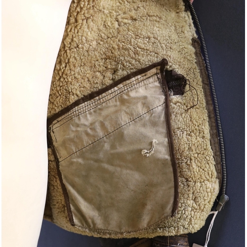 299 - An American US Air Force sheepskin flying jacket, with applied label in collar reading TYPE .. SIZ... 