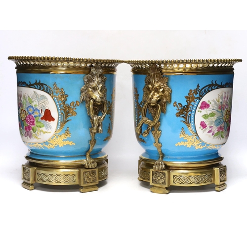 301 - A pair of brass mounted Kusnetzoff style jardinières hand painted with figures, 28cm high