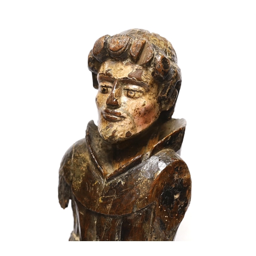 302 - An oak carved monk with polychrome face, 54cm high