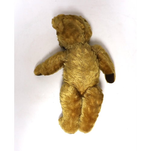 307 - A mid 20th century teddy bear, probably Merrythought, 37cm high