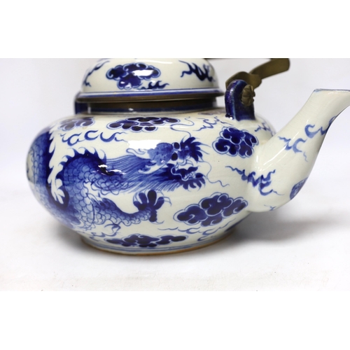 308 - A large Chinese blue and white dragon teapot, 38cm wide