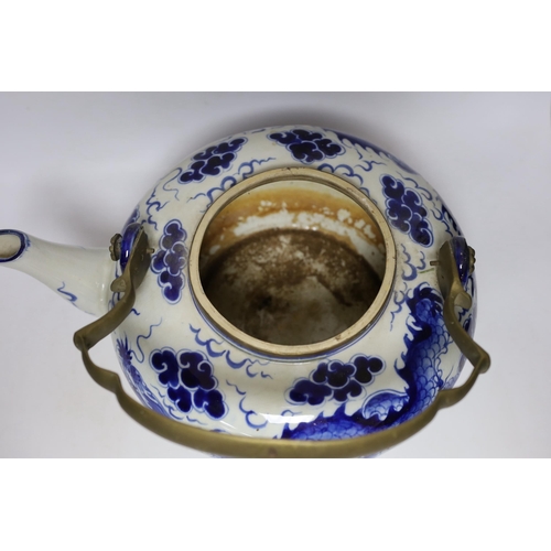 308 - A large Chinese blue and white dragon teapot, 38cm wide