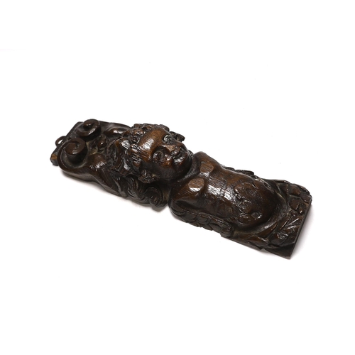 312 - Three 17th century carved oak figural corbels together with corbel end in the form of a lion, larges... 