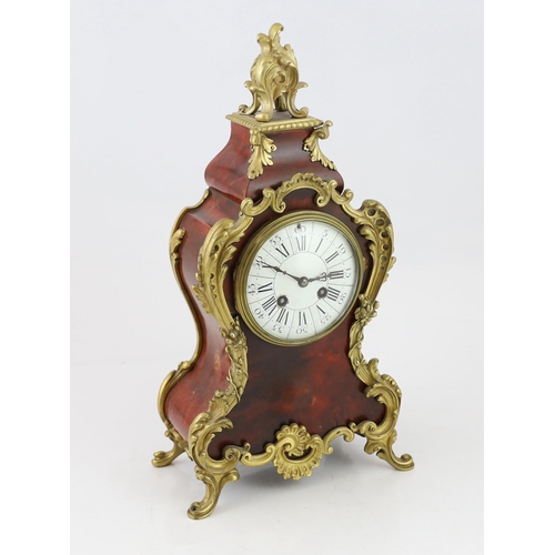 313 - An early 20th century French ormolu mounted red tortoiseshell eight day mantel clock, of Louis XVI s... 