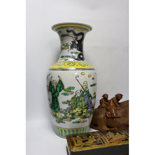 328 - A Chinese famille verte vase, a papier-mâché box and a Chinese hardwood carving of an ox, tallest 42... 