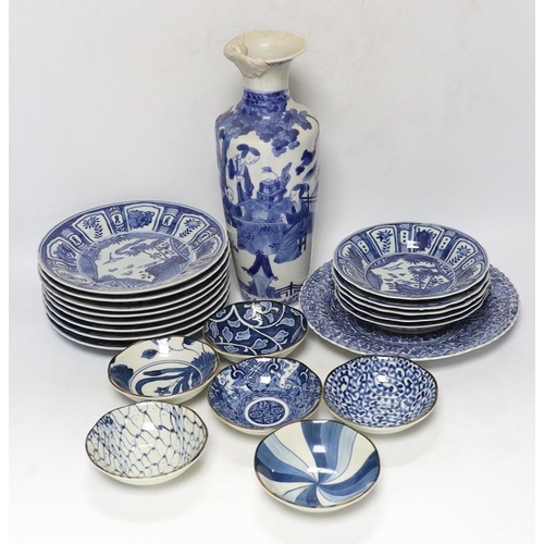 329 - A group of Chinese blue and white dishes and plates and a damaged vase, 30cm