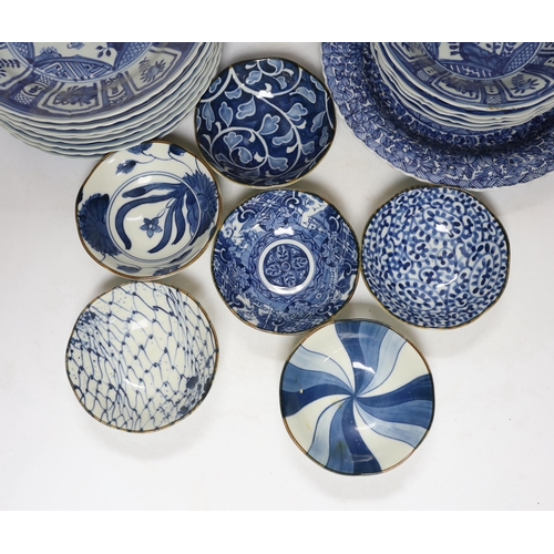 329 - A group of Chinese blue and white dishes and plates and a damaged vase, 30cm