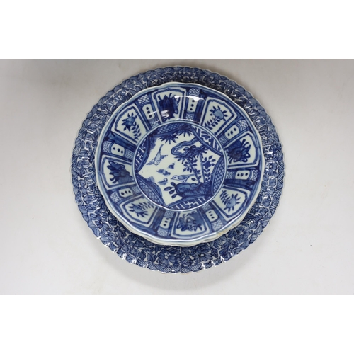 329 - A group of Chinese blue and white dishes and plates and a damaged vase, 30cm