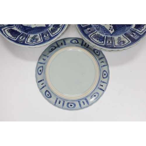 329 - A group of Chinese blue and white dishes and plates and a damaged vase, 30cm