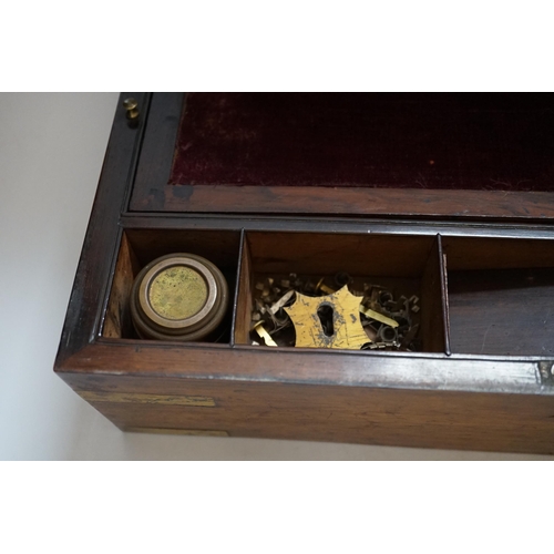 334 - A Victorian rosewood brass bound writing slope, 40cm wide x 15cm high