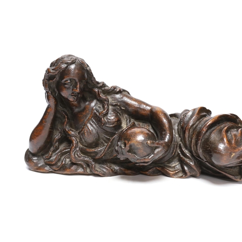 339 - A 17th century carved oak figure of the penitent Mary Magdalene, possibly English, 52.5cm