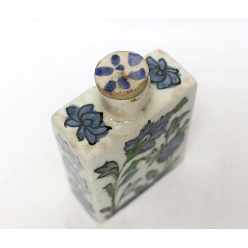 352 - An Iznik tin-glazed pottery flask and cover, 15cm