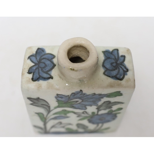 352 - An Iznik tin-glazed pottery flask and cover, 15cm