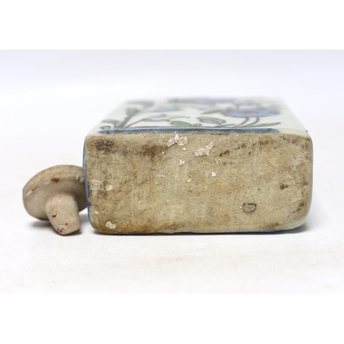 352 - An Iznik tin-glazed pottery flask and cover, 15cm