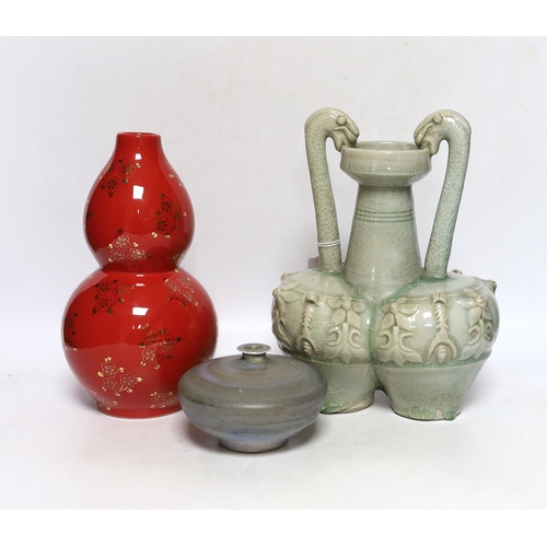 369 - A Chinese red ground vase, Chinese celadon conjoined dragon handled vase and a studio pottery vase, ... 