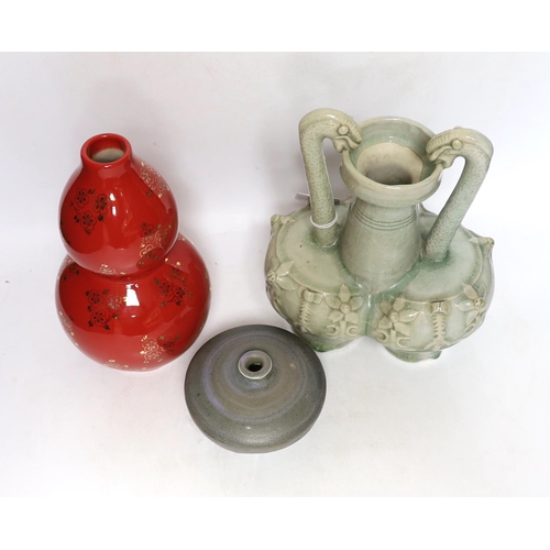 369 - A Chinese red ground vase, Chinese celadon conjoined dragon handled vase and a studio pottery vase, ... 