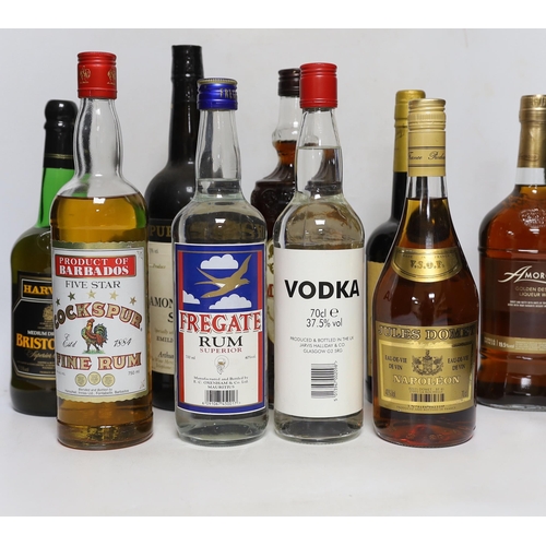 370 - A selection of spirits, brandies and sherries to include Smirnoff, Jules Dumet, Cockspur etc,