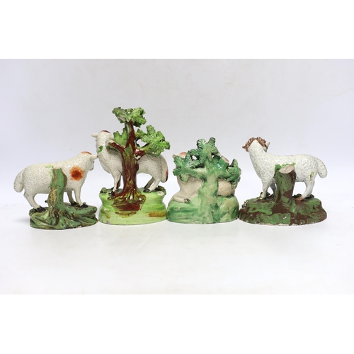 373 - Four Staffordshire pearlware figures of sheep, c.1820-30, one with rare initials PW to its back, l... 