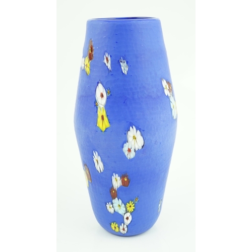 374 - ** ** Vittorio Ferro (1932-2012) A Murano glass Murrine vase, the blue ground scattered with polychr... 