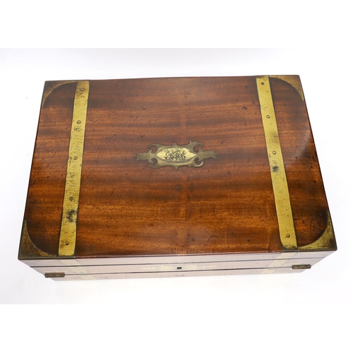 384 - A 19th century brass bound mahogany writing slope, 35cm wide x 13.5cm high x 25cm deep