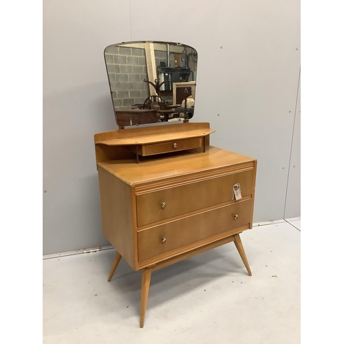 39 - A mid century two drawer dressing table, width 76cm, depth 42cm, height 130cm