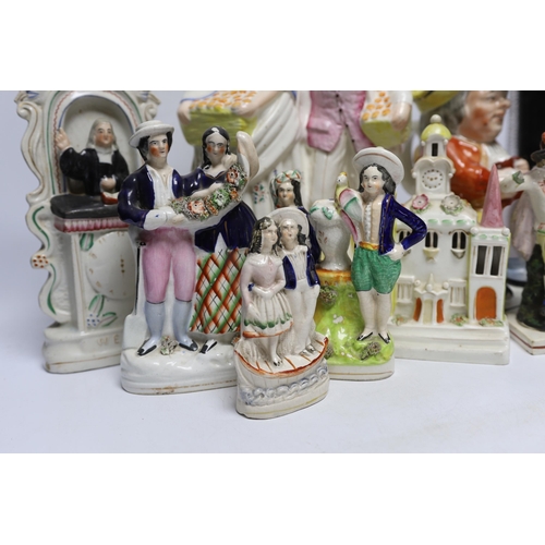 394 - Seven 19th century Staffordshire figure groups including Orange Sellers and Wesley, together with a ... 