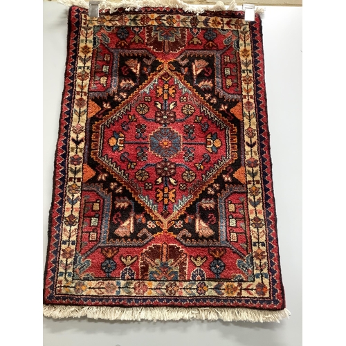 4 - Two North West Persian rugs, larger 130 x 70cm