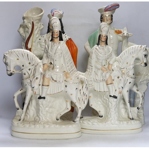 409 - A pair of large mid 19th century Staffordshire pottery highland hunters, on horseback and three othe... 