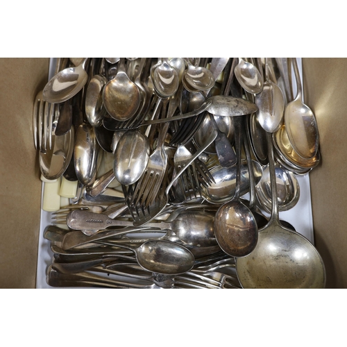 413 - Three silver napkin rings, three silver spoons and a quantity of silver plated cutlery.