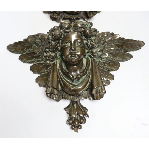 416 - A pair of resin cherub brackets 'bronzed', 29 x 47cm