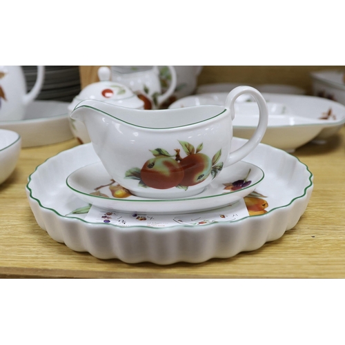 417 - A large quantity of Royal Worcester Evesham Vale serving dishes and dinnerwares