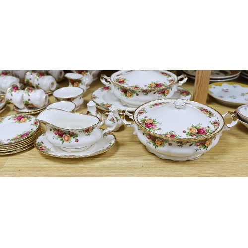 421 - A Royal Albert Old Country Rose dinner service and tea service including trios, tureens and oval dis... 