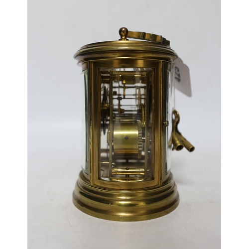 425 - A late 19th century French oval brass cased eight day carriage clock