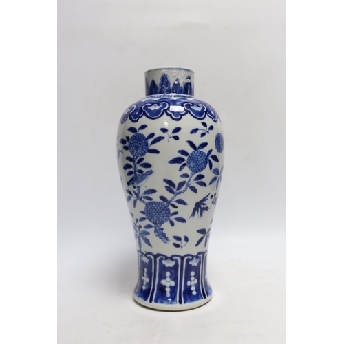 430 - A Chinese blue and white baluster 'blackbirds amid blossom' vase, Kangxi mark, but late 19th century... 