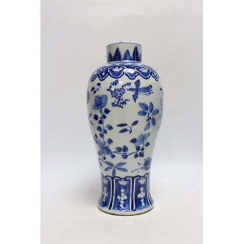 430 - A Chinese blue and white baluster 'blackbirds amid blossom' vase, Kangxi mark, but late 19th century... 