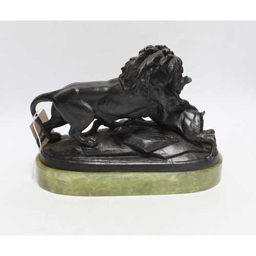 434 - An early 20th century spelter lion group on onyx base, 27cm long