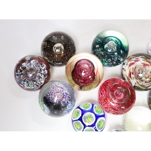 443 - Thirteen glass paperweights including Caithness and Murano, largest 9cm in diameter