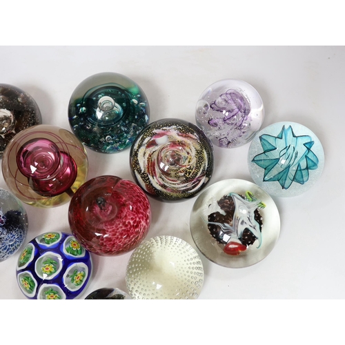 443 - Thirteen glass paperweights including Caithness and Murano, largest 9cm in diameter