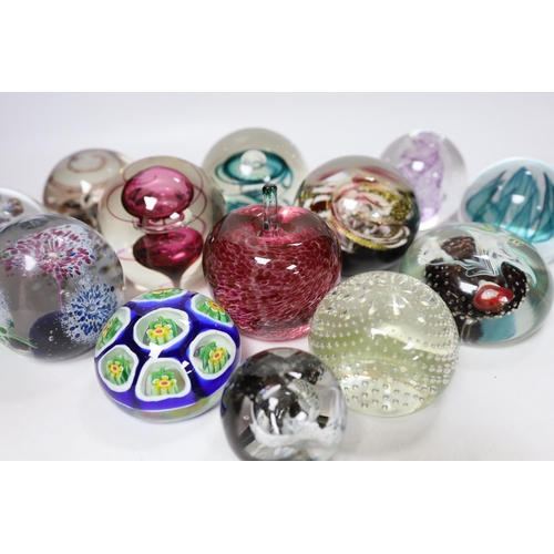 443 - Thirteen glass paperweights including Caithness and Murano, largest 9cm in diameter