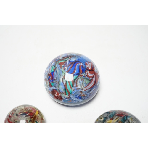 452 - Three 19th century Venetian scrambled glass paperweights, largest 8.5cm