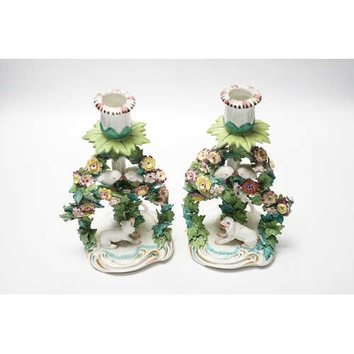 454 - A pair of Samson porcelain chambersticks, in Derby style, with floral encrusted decoration, 19cm hig... 