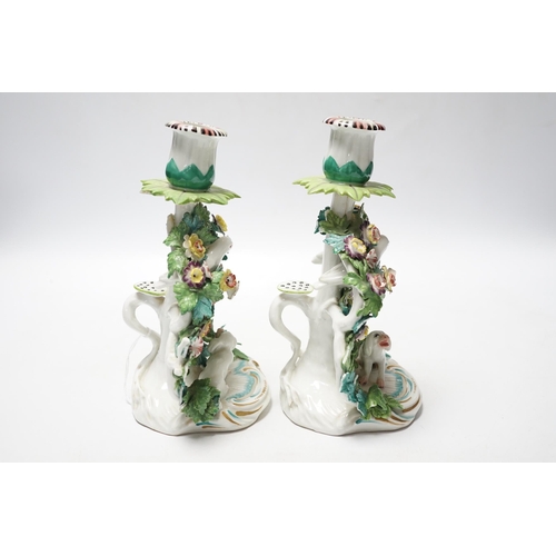 454 - A pair of Samson porcelain chambersticks, in Derby style, with floral encrusted decoration, 19cm hig... 