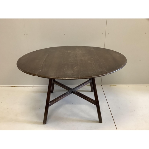 46 - An Ercol elm drop leaf dining table, 124cm extended, width 112cm, height 71cm and six Ercol elm and ... 